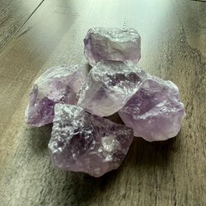 Raw Amethyst chunks. 5/$40 or $10 each. Each averages 4 cm in length.